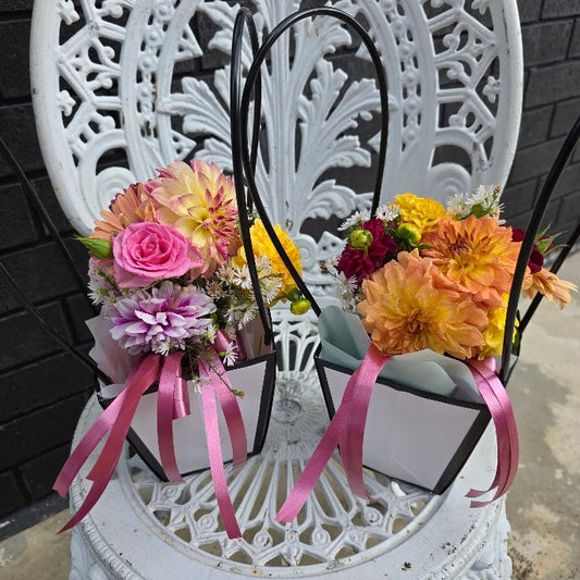 Lovey little Carry bags with a mini bunch of flowers to give directly as a gift, compliment or to say words you find hard to say.