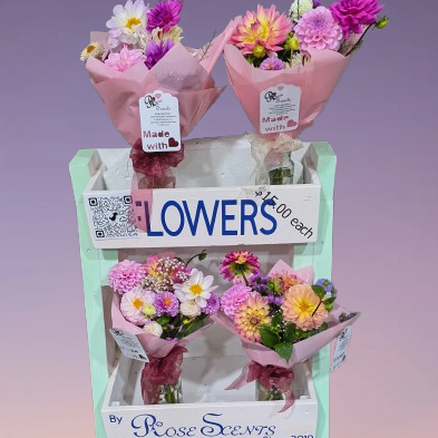 Flower stand with bouquets of flowers that are sold at our retailers